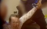 Image of a woman being manhandled taken from BBC Panorama documentary. 