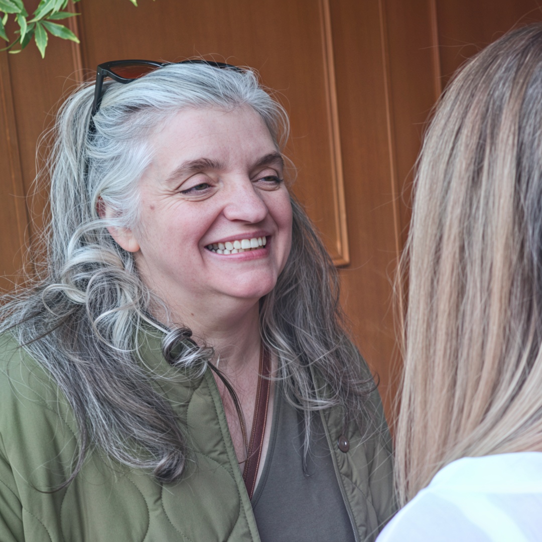 A smiling guest at our Shared Lives carer gathering