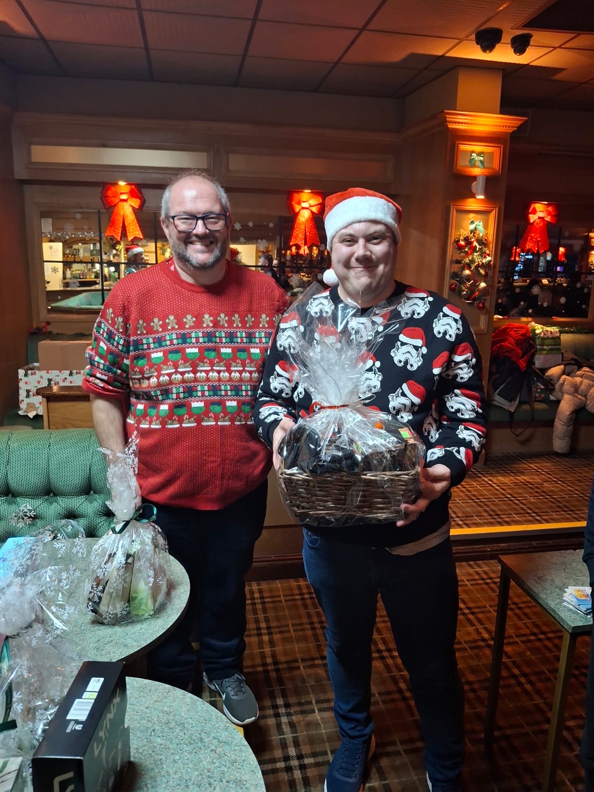 Josh winning himself a raffle prize at the Wales Christmas party.