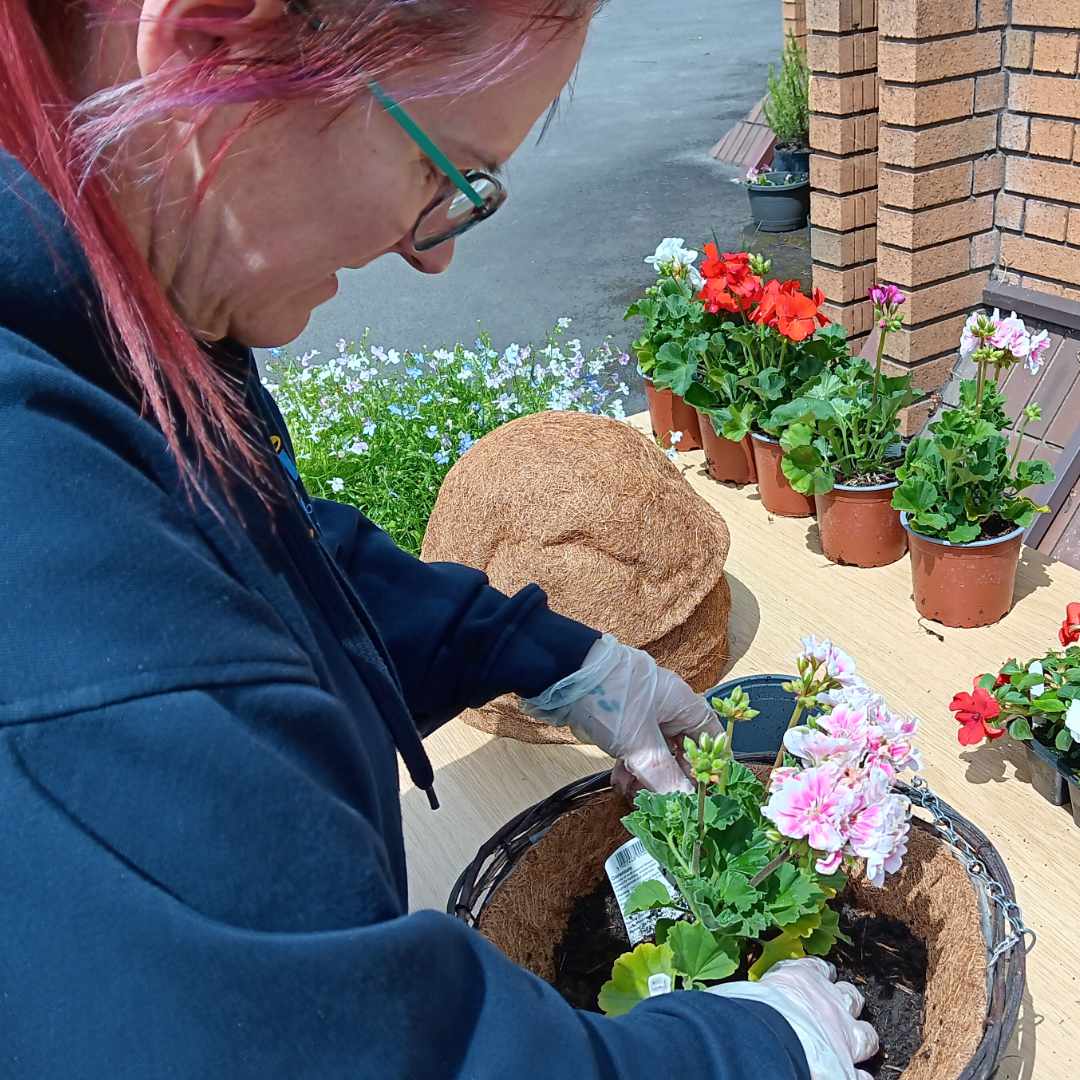 A photo of one of our colleagues during the plant refresh day at Ategi's Head office