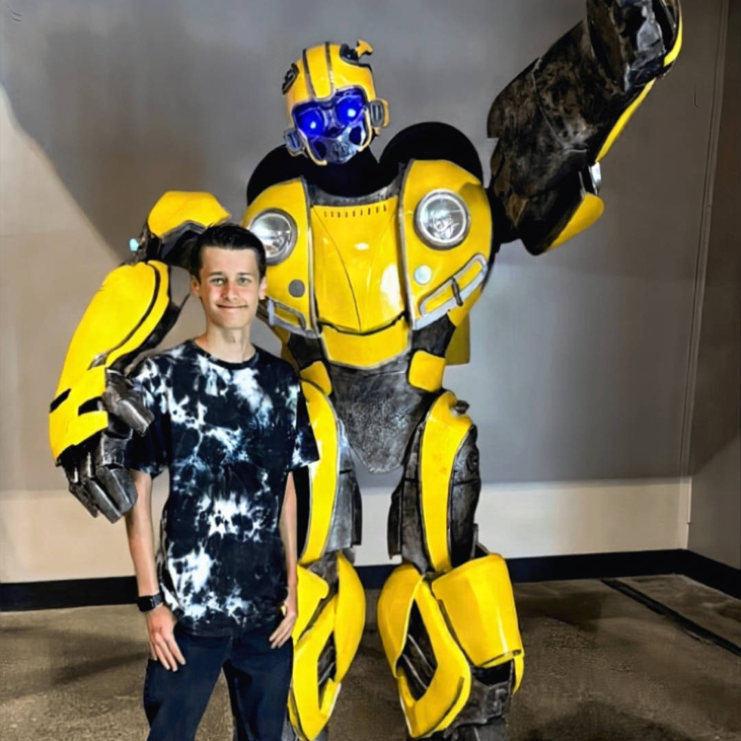 A picture of Dante and the Transformer character Bumblebee
