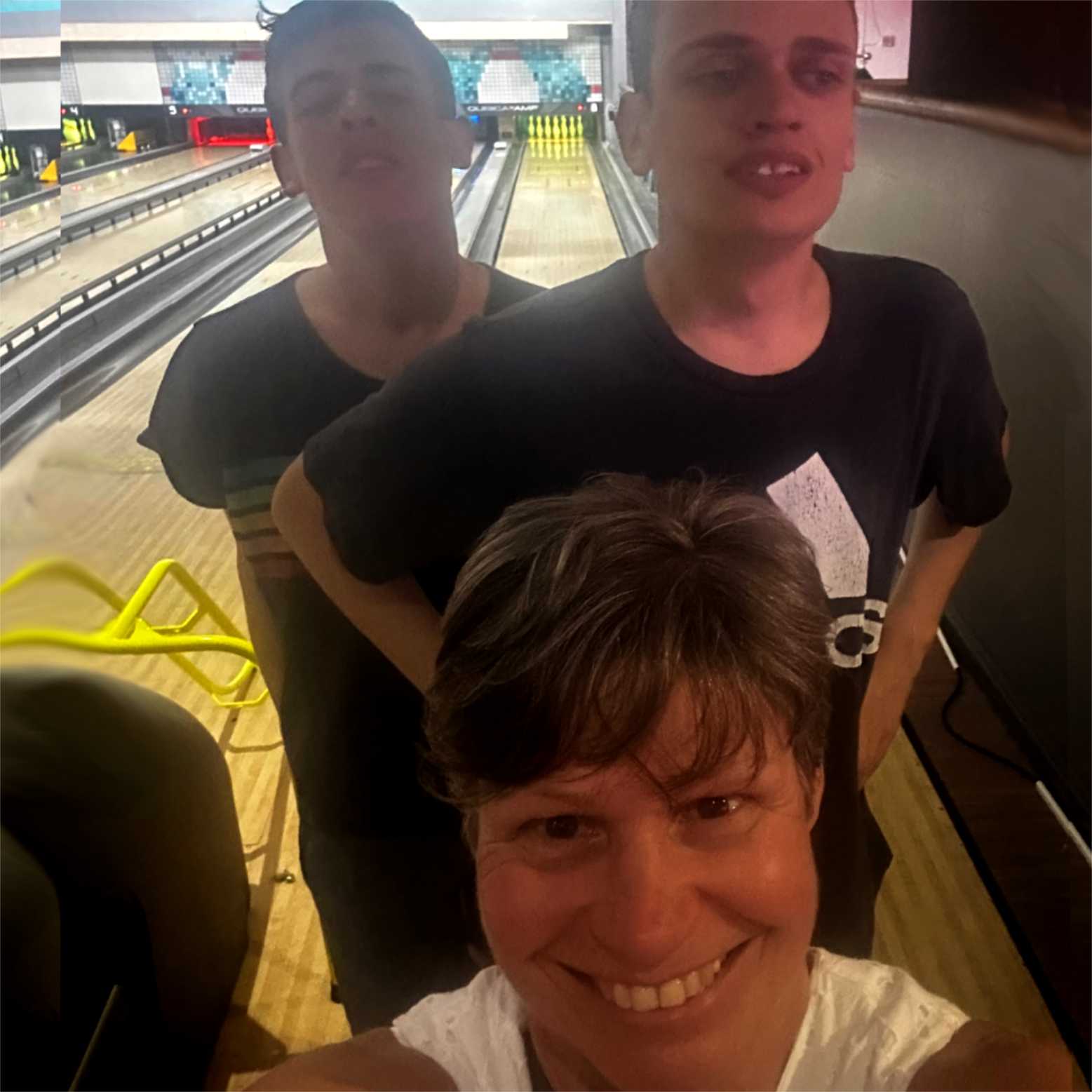 An image picturing JS and DS on the bowling alley.