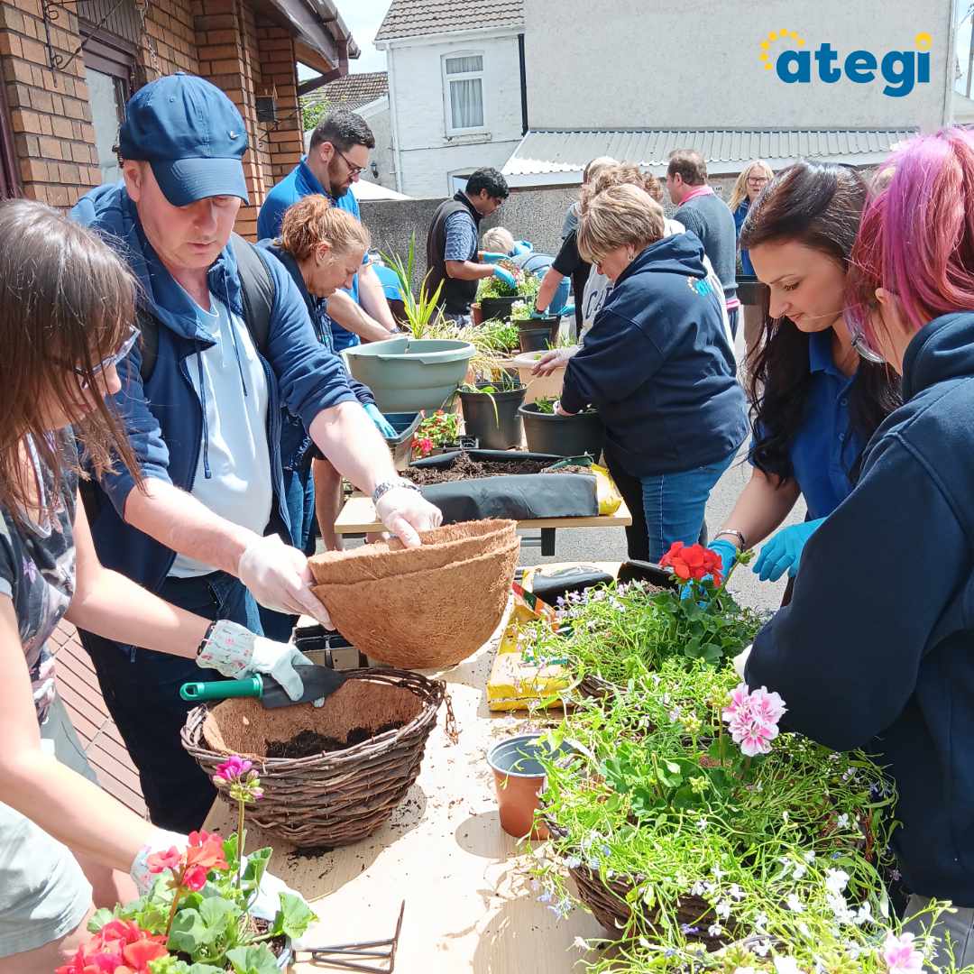 A photo of our colleagues, people we support and guest at Ategi's plant refresh.