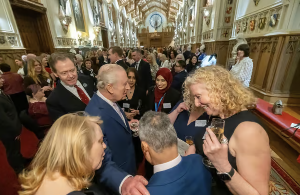Kam meeting the King at Windsor Castle