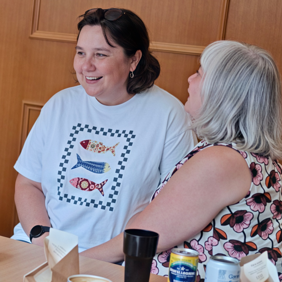 Two women enjoying happy conversation