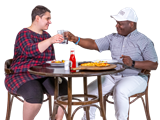 Two people having a meal together and raising their glasses.  