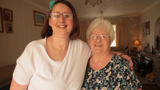 Wendy with her Shared Lives carer, Grazelda. Both women are smiling at the camera.