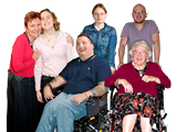 Image of different kinds of people, some in wheel chairs. 