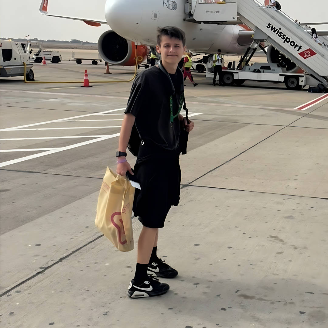 A picture of Dante on an airport runway